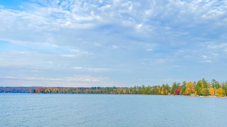Burt Lake with fall colors in background