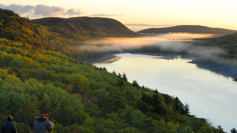 Lake of the Clouds during sunset with clouds hovering over