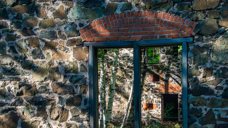 View through window of abandoned stone building Delaware Town