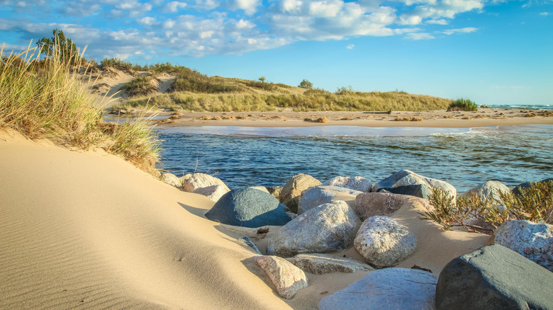 A beach with white sand at Ludington State Park in Michigan