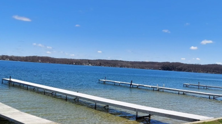 Docks in lake with sandy bottom