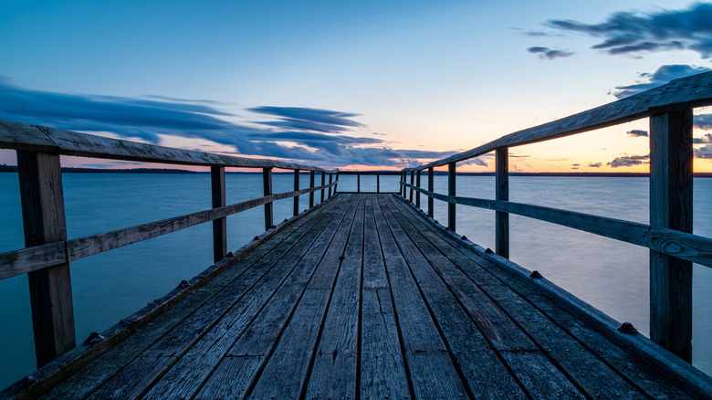 Mullet Lake Low Perspective of Dock at Aloha State Park During Sunset and Blue Hour