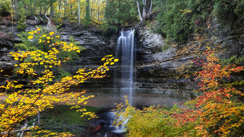 A waterfall surrounded by fall foliage in Michigan
