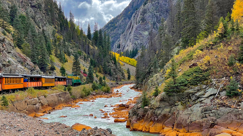 Historic Durango-Silverton steam train riding through mountains