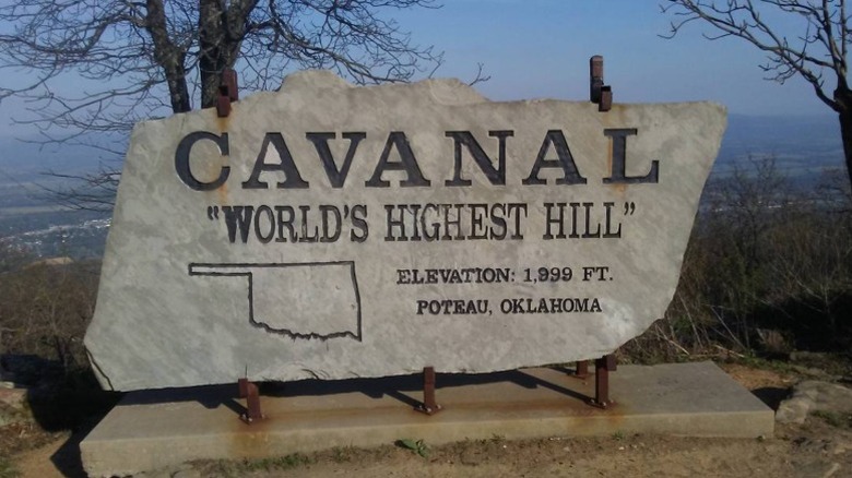 A sign reading "Cavanal 'World's Highest Hill'" on top of Cavanal Hill.