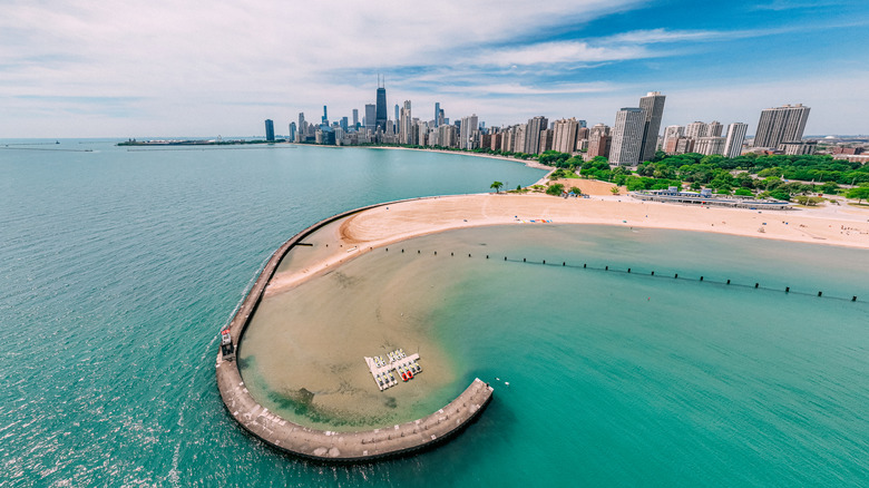 An aerial view of North Avenue Beach with the Chicago skyline in the background