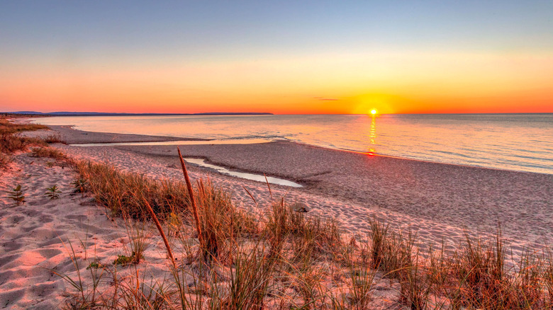 Sunset over Lake Michigan from a beach at Sleeping Bear Dunes in Michigan