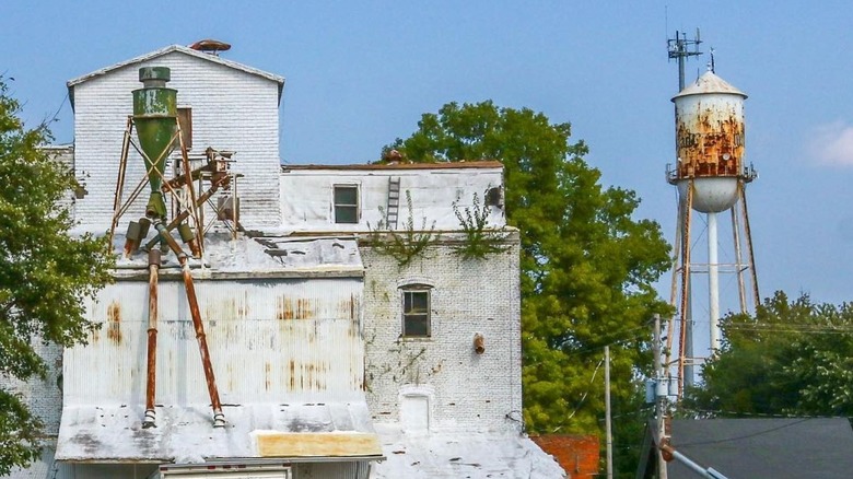 White historic mill and watertower in Millstadt