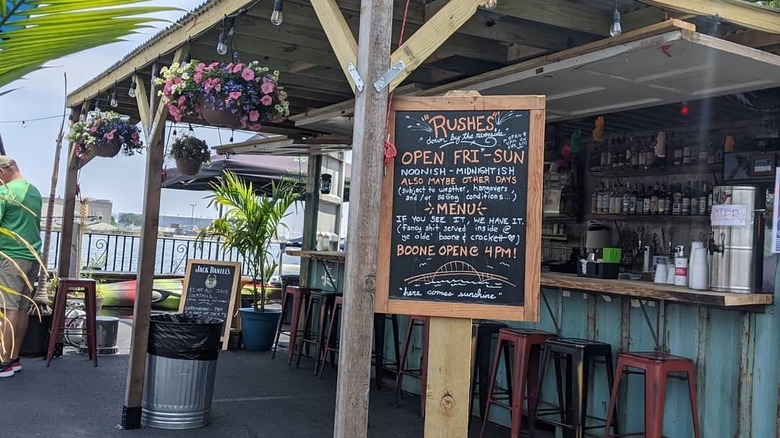 Chalkboard menu and bar at Boone & Crockett Milwaukee