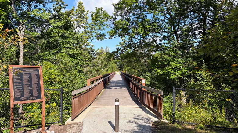 Trail bridge path in Wisconsin's Fox Point surrounded by trees