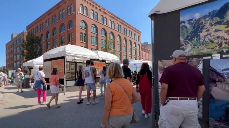 People walking around the Third Ward Art Festival in Milwaukee