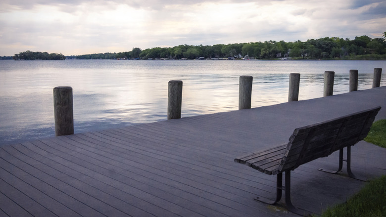 Bench in front of Pewaukee Lake