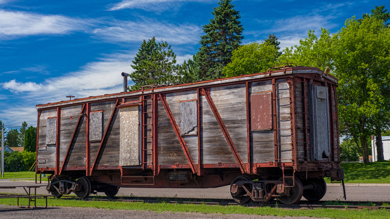 Old rail car near the depot and library in Onamia