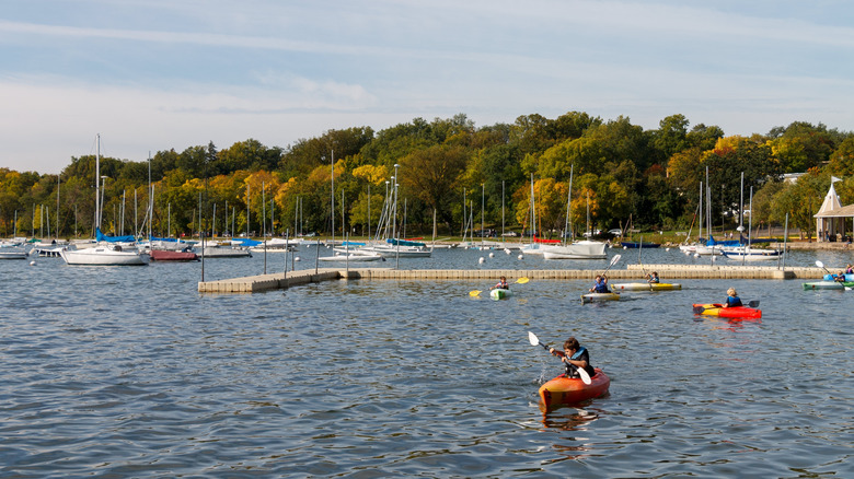 Kayakers paddle on Minnesota's Lake Harriet.