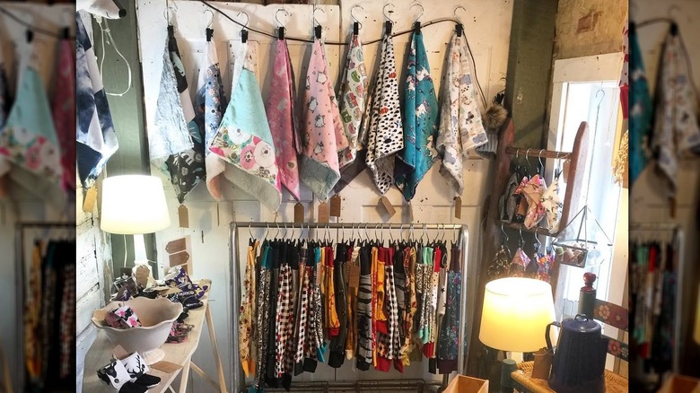 Interior of Buffalo Nickel Antique Market, with clothes hanging
