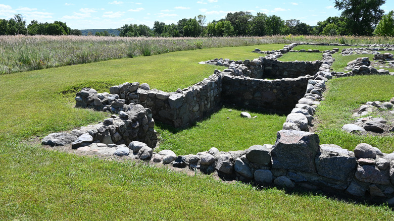 Stone walls outline the cellars of ruined buildings in Fort Ridgely State Park, Minnesota