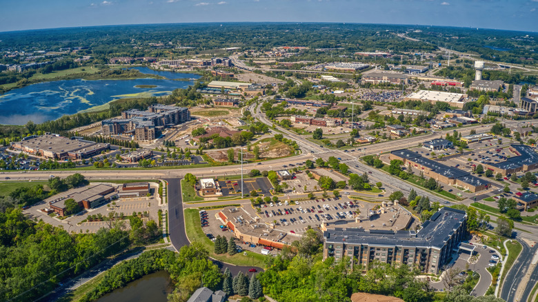 City streets and highways with trees and lakes