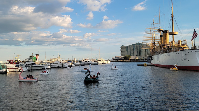 Swan boats and ship on the Delaware River by Spruce Street Harbor Park, Philadelphia