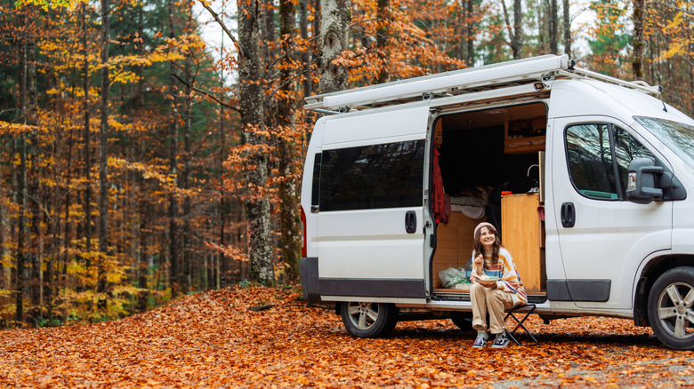 RV camping in fall amidst the woods