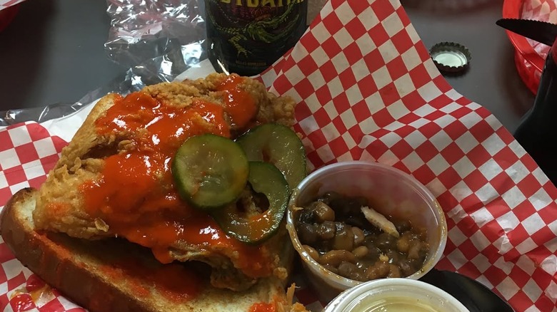 Fried chicken plate with ketchup and pickles