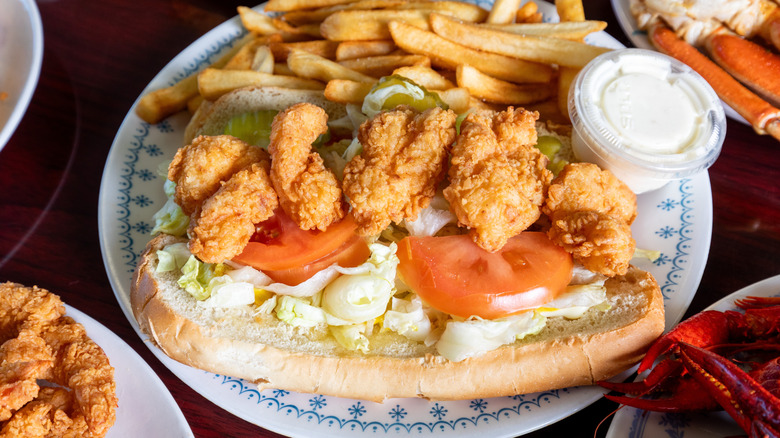 Shrimp po'boy with fries and dressing on the side