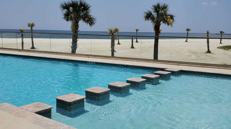 Beachside view from a pool at Island View Casino Resort