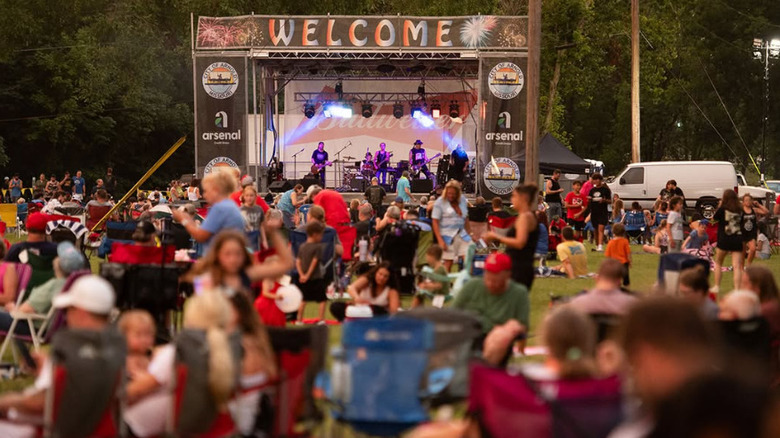 People sitting in front of a stage during a Fourth of July festival in Arnold, Missouri.