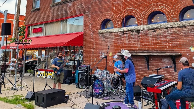 A band plays in front of Prospero's bookstore in Kansas City, Missouri