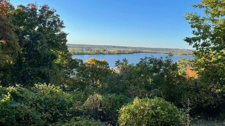 Creve Coeur Lake lies far below, as seen from one of the woodland trails in Creve Coeur Lake Park