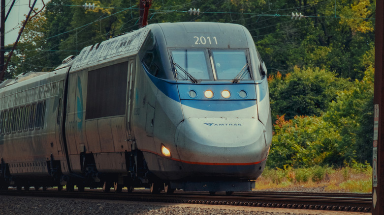 Amtrak train driving down track