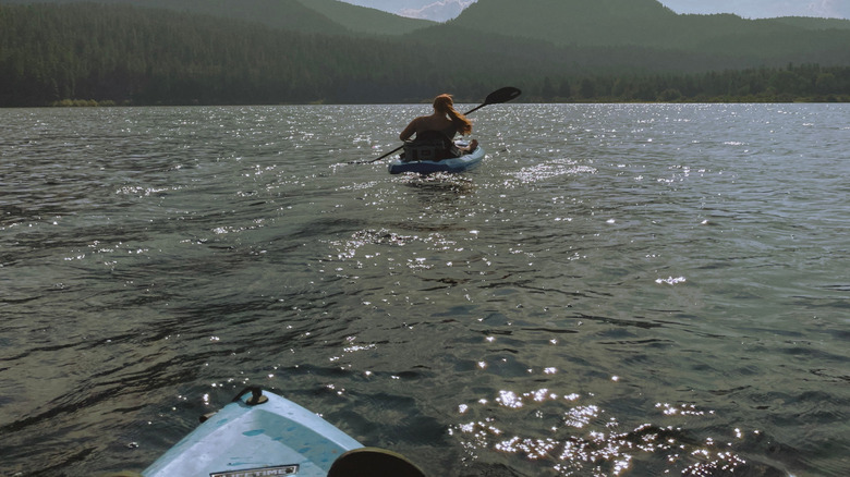A person kayaking on Tally Lake in Montana