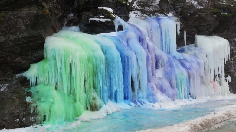 Rainbow colored frozen waterfall in Bad Rock Canyon
