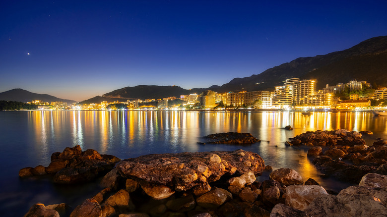 The shoreline of Budva, Montenegro, illuminated during the evening