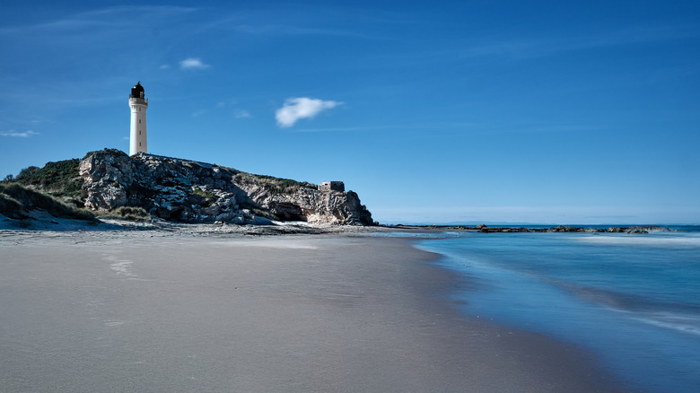 Covesea Lighthouse as seen from the beach below on the Moray Firth coast