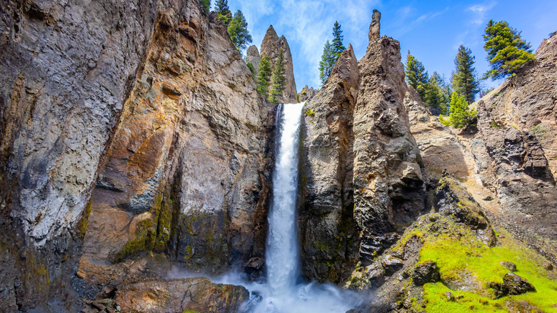 A panoramic ground level view of Tower Fall in Yellowstone National Park