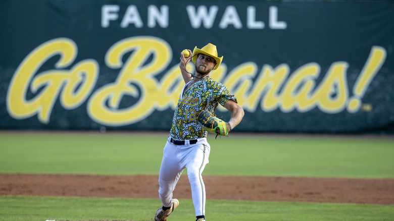 Kyle Luigs #12 of the Savannah Bananas pitches against the Party Animals at Grayson Stadium on May 13, 2023 in Savannah, Georgia.