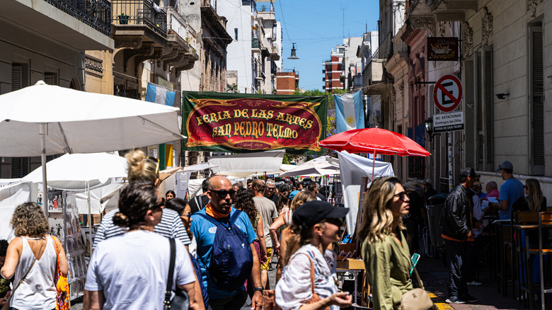 People walking through the antiques market in San Telmo, Buenos Aires