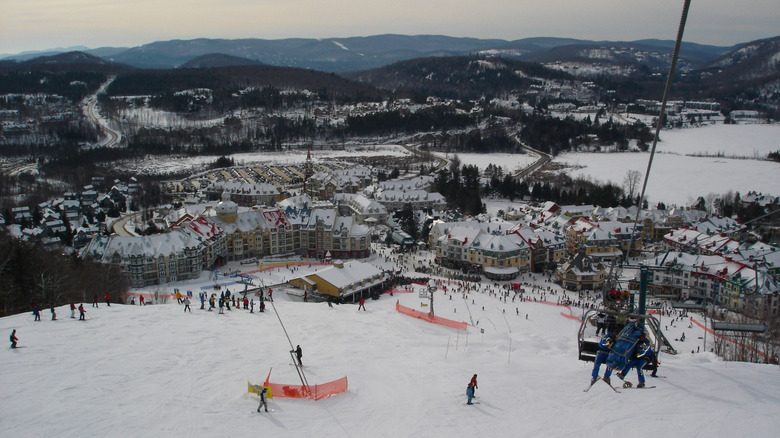 Skiers in the snow at mountain resort