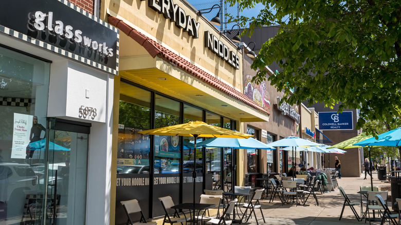 Eateries and outdoor seating line a commercial strip in Squirrel Hill, Pittsburgh.