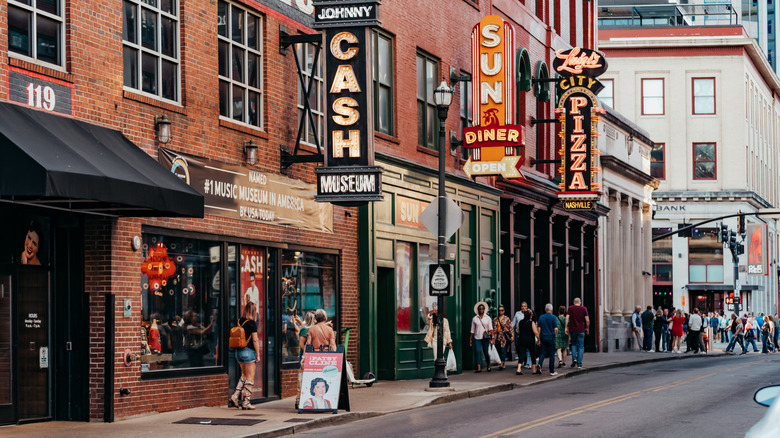 people walking in front of the Johnny Cash Museum in downtown Nashville