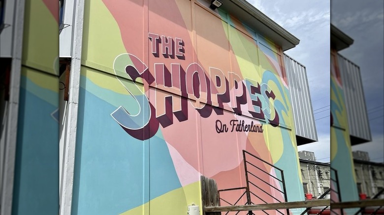 the mural at the entrance of the Shoppes on Fatherland