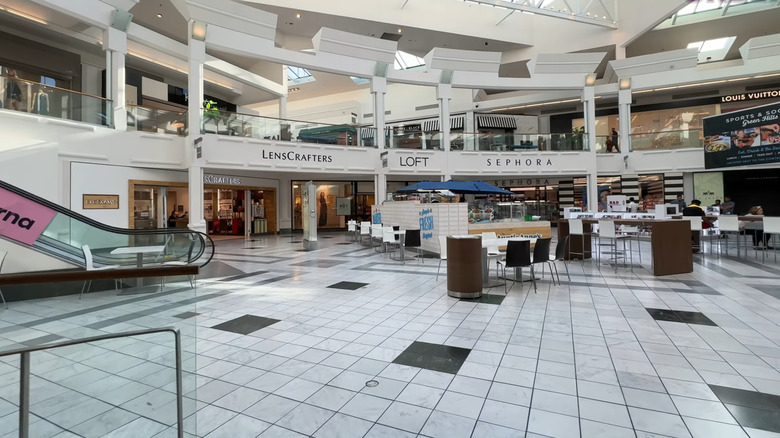 shops visible across a lobby in The Mall at Green Hills