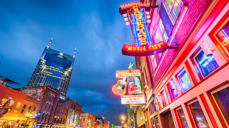 Vibrant city lights on downtown streets in Nashville, Tennessee