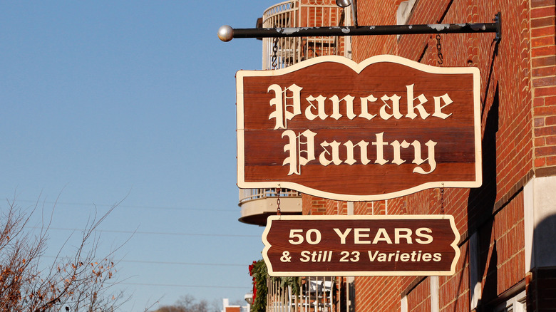 Hanging business sign outside of Pancake Pantry in Nashville