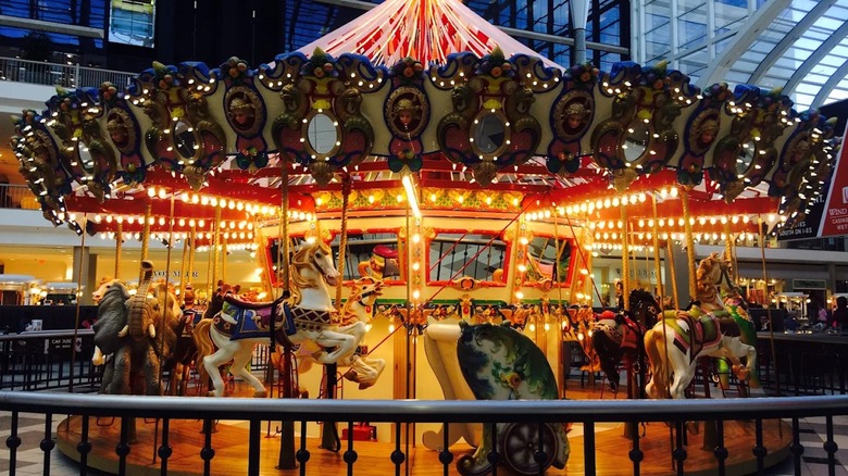 An illuminated carousel in the Opry Mills Mall