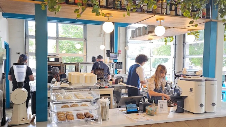 Baristas working behind the counter at Stay Golden in Nashville