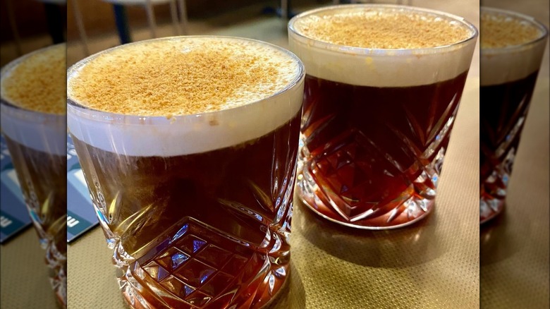 Two coffee cocktails with cream tops, dusted in nutmeg at Stay Golden, Nashville