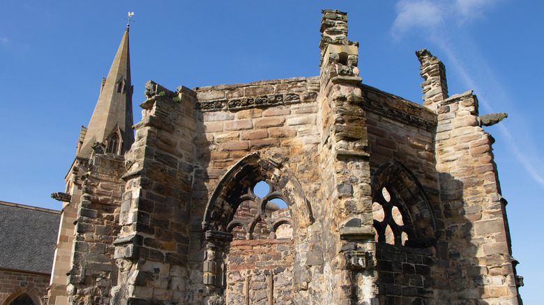 Ruins of part of St Nicholas Buccleuch Church against blue sky
