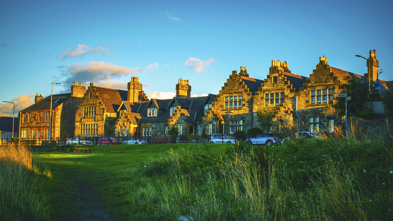 Traditional geometric stone historic buildings and blue sky Prestonpans.