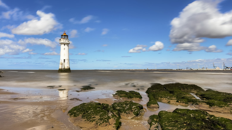 New Brighton Lighthouse and the shore of New Brighton Beach.